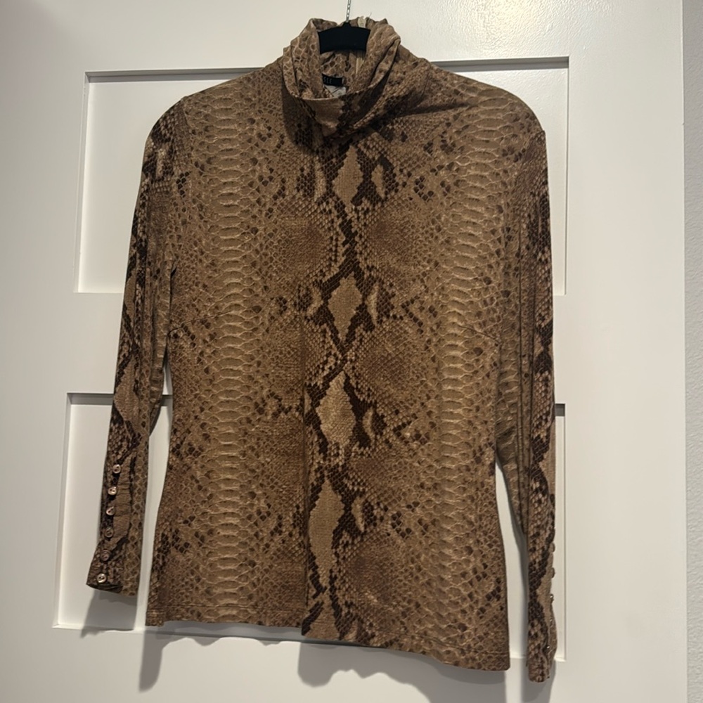 Beautiful Carlisle snakeskin turtle neck. Viscose blend size medium